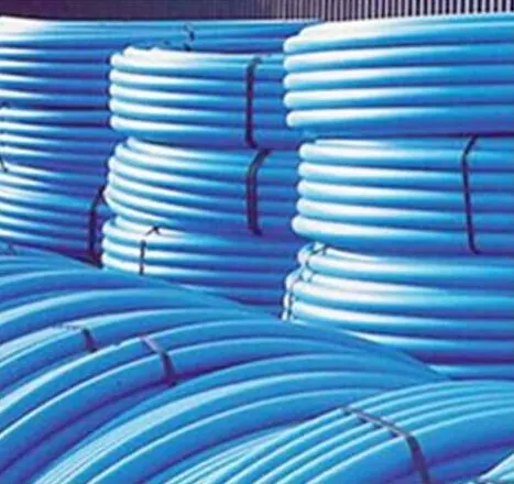 Coils of blue HDPE pipe